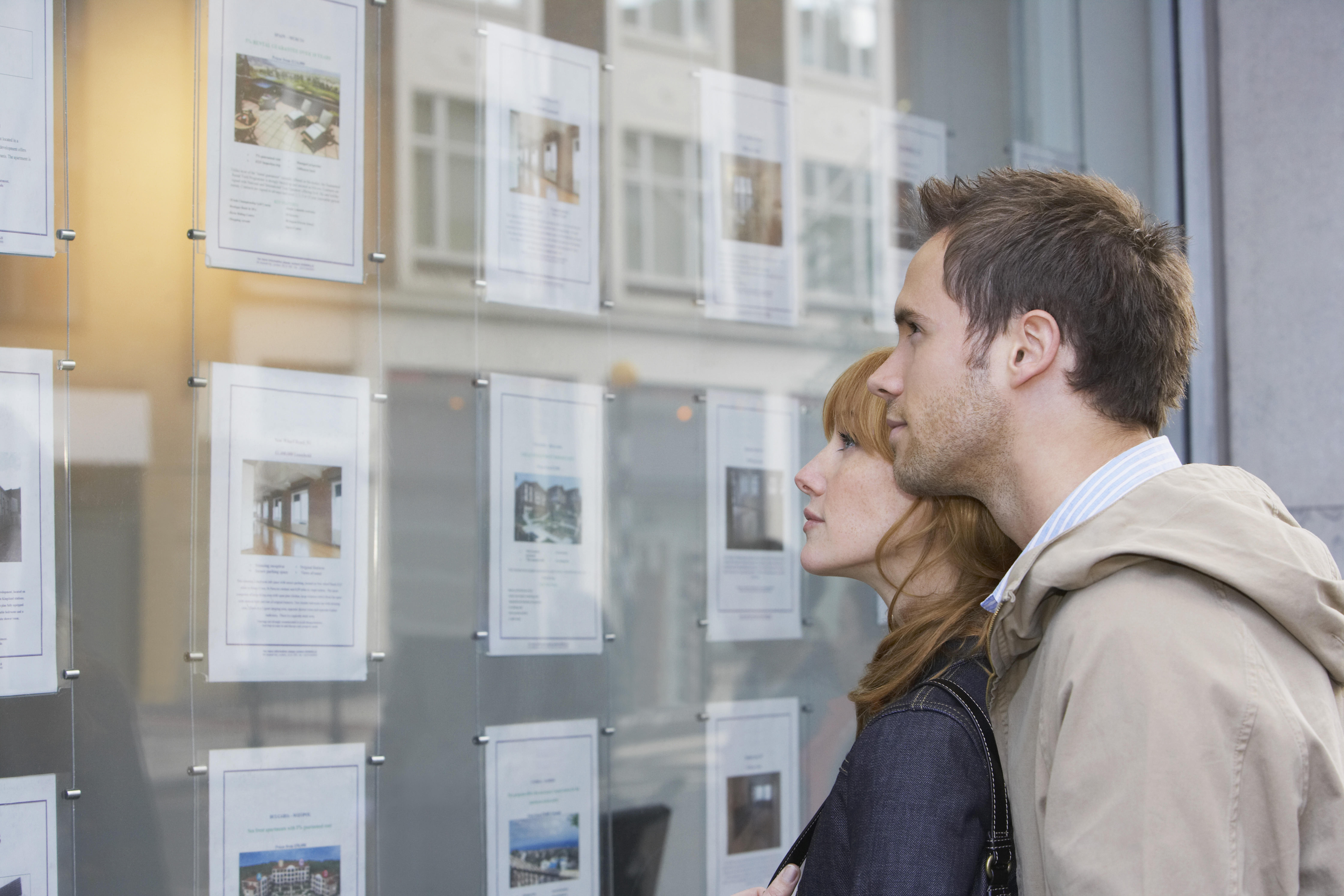 Couple looking at properties