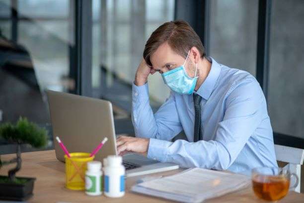 Man wearing a mask at work